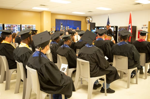 Graduates listen to ceremony speaker at Trousdale